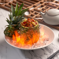 Sweet and Sour Pork in Flaming Pineapple