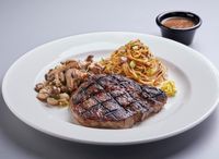 W203D. Chargrilled Ribeye With Creamy Mushroom Sauce + 2 Sides